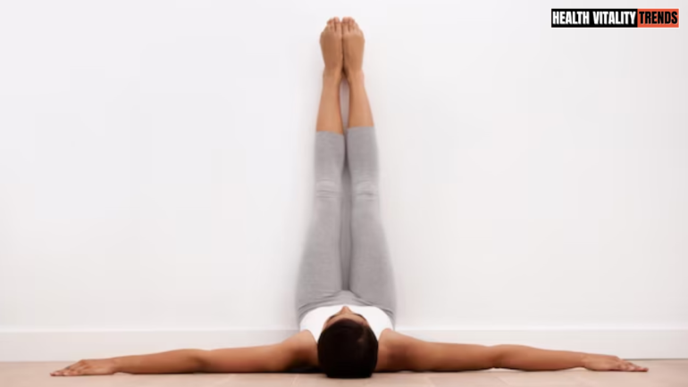 The Wall Yoga Pose That Helps Relieve Tight Hamstrings